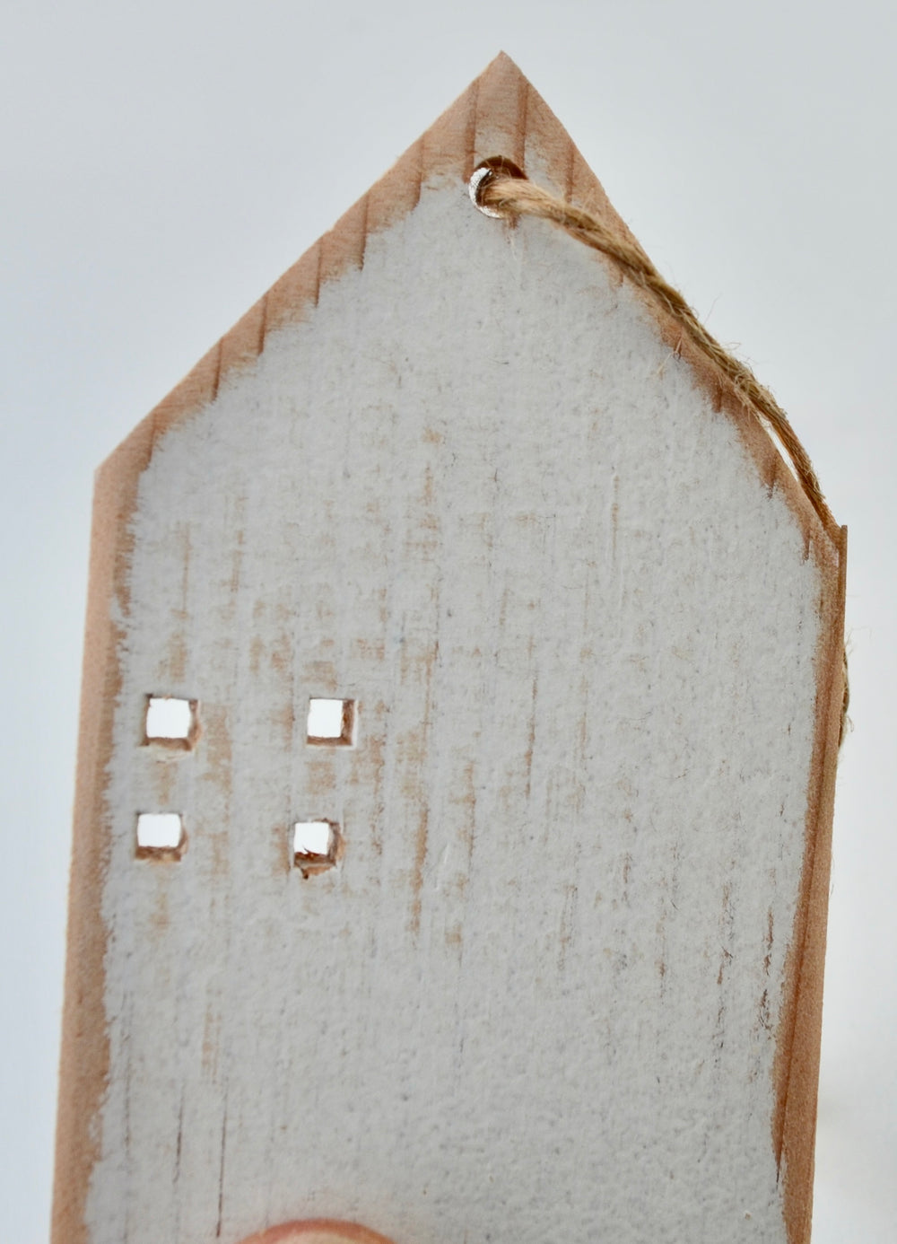 One Distressed House Ornament