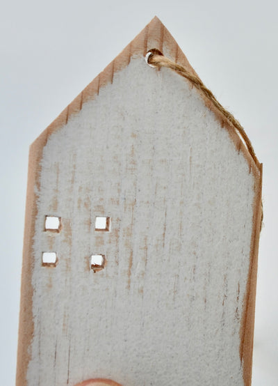 One Distressed House Ornament