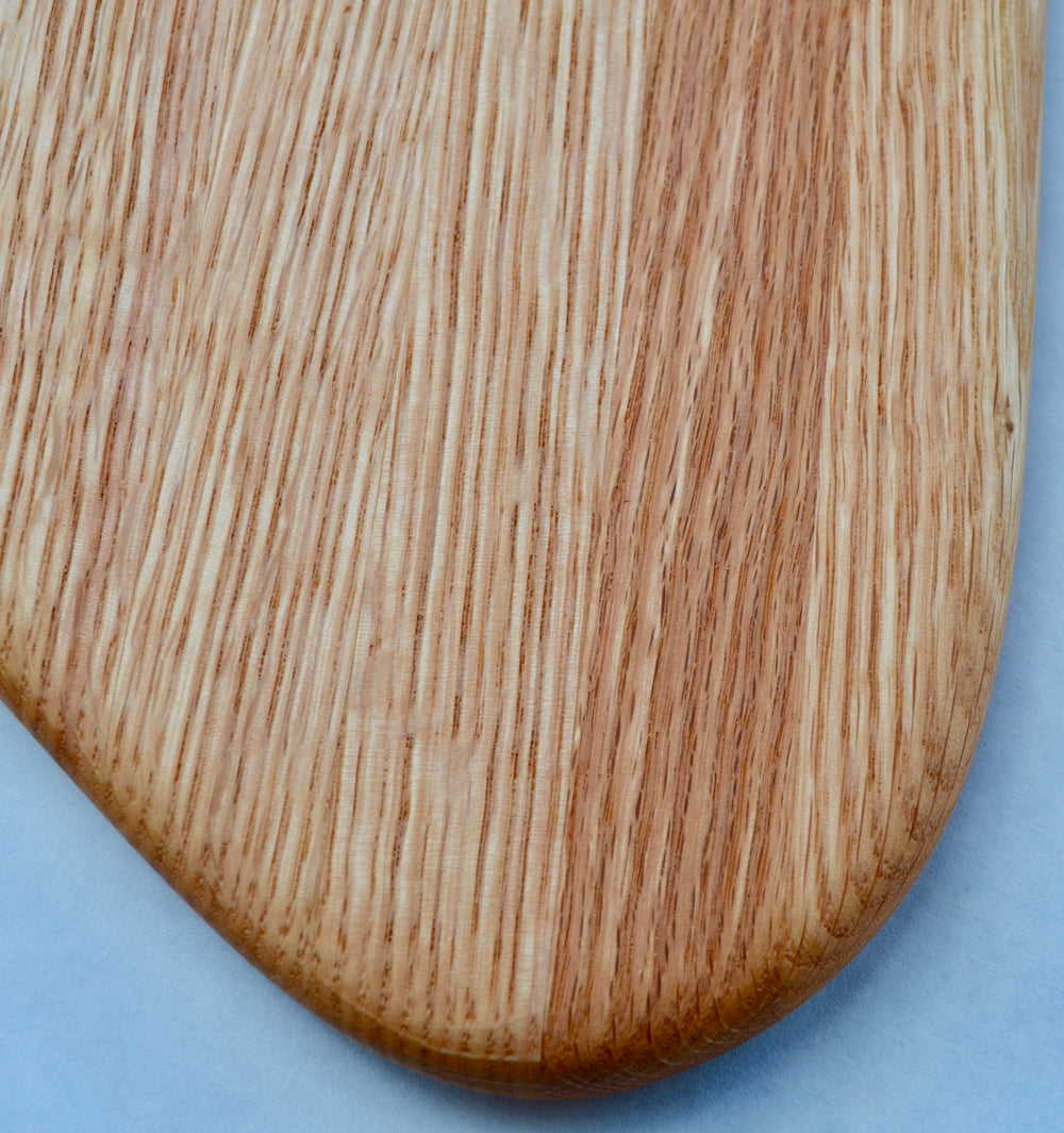 Triangle cutting board handcrafted from Oak